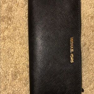 Michael Kors Black and Gold Zip Wallet